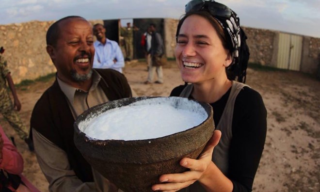 Berenika Stefanska enjoys some camel’s milk in Somalia on one of her many adventures in Africa